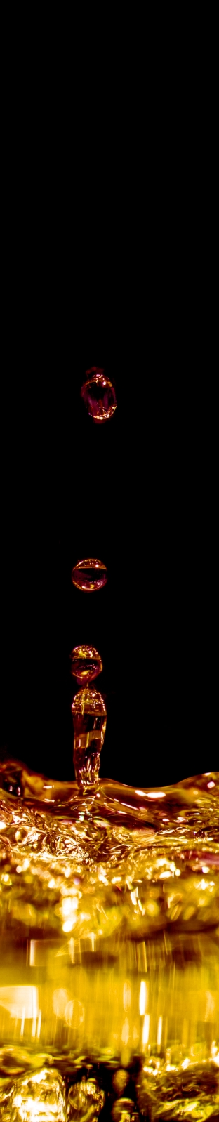 Close-up of whisky being poured